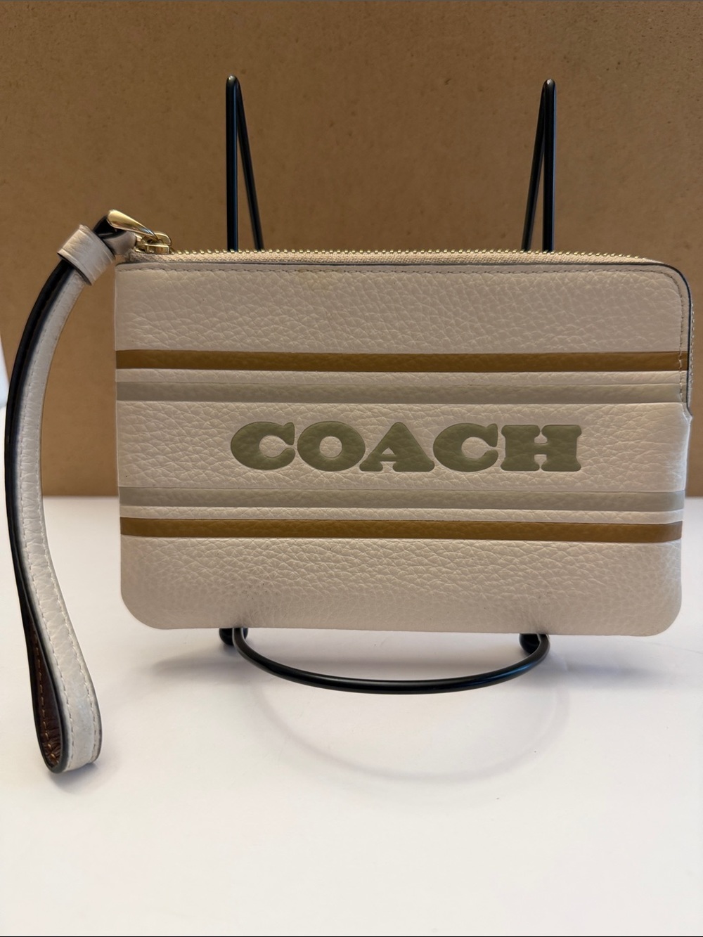 COACH Corner Zip Wristlet in Cream with Gold Stripe